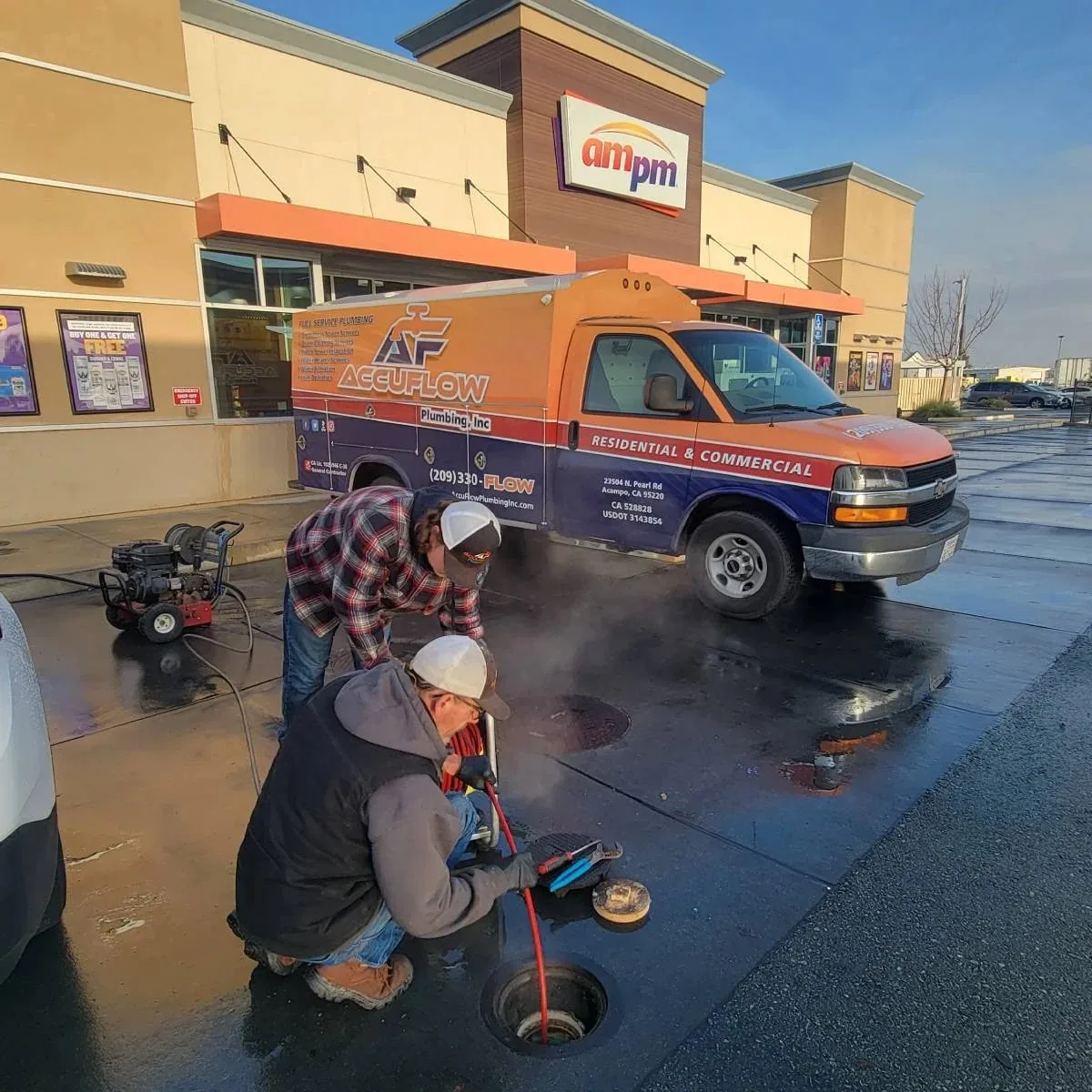 AccuFlow tech performing drain cleaning