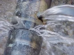 Water leak from a damaged pipe